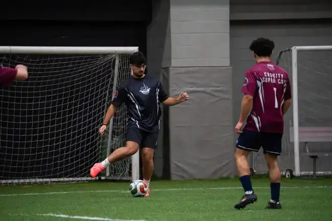 Goalkeeper defending the net