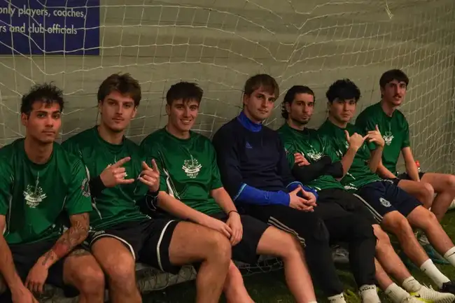 Team sitting together on the bench