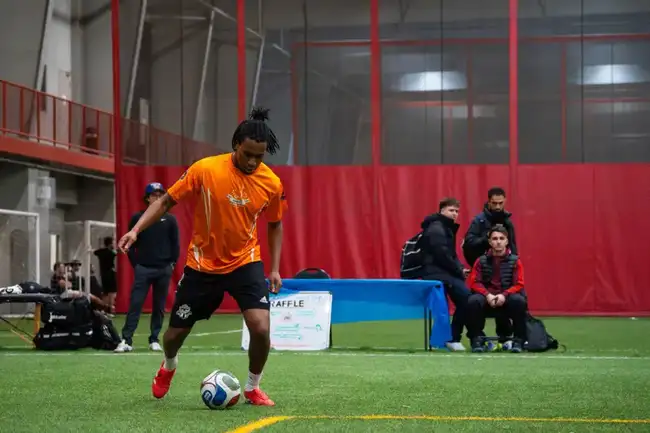 Player warming up near the on-site physio treatment area